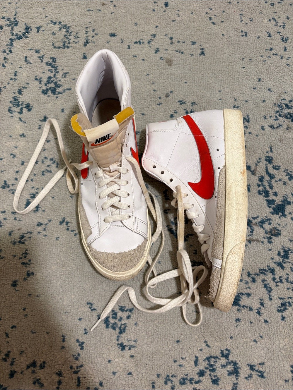 Nike Women White High-Top Sneakers with Red Swoosh